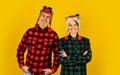 Having fun. Decide what style you are going for. Family tradition. Christmas time. Loving couple wear funny hats