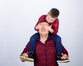 Having fun. Fathers day. Father example of noble human. Best friends forever. Father little son red shirts family look Royalty Free Stock Photo