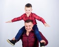 Having fun. Fathers day. Father example of noble human. Family time. Best friends. Father little son red shirts family Royalty Free Stock Photo