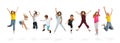 Group of elementary school kids or pupils jumping in colorful casual clothes on white studio background. Creative Royalty Free Stock Photo