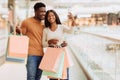 Happy black couple taking selfie at shopping mall Royalty Free Stock Photo