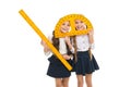 Having fun in school. Pupil cute girls with big rulers. School children with measuring instruments. Geometry favorite