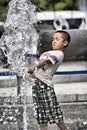 Having fun in summer fountain Royalty Free Stock Photo