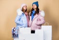 Having fun together. Black friday. Buy winter clothes. Sale and discount. Women friends shopping winter clothes