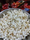 Having indian popcorn for timepass on winter day Royalty Free Stock Photo