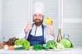 Having lunch. Bearded man cook in kitchen, culinary. Vegetarian. Mature chef with beard. Dieting and organic food Royalty Free Stock Photo