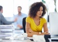 Having a productive day at the office. an attractive young businesswoman working at her office desk. Royalty Free Stock Photo