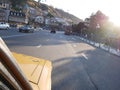 Having a ride in yellow city Tour old russian car in Tbilisi - seen from open passanger perspective