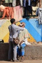 Having a shave in Dharavi Royalty Free Stock Photo