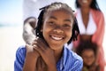 Having such an amazing time with my family. Closeup portrait of a young african american boy enjoying a day at the beach Royalty Free Stock Photo