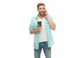 Having talking conversation. Coffee break. Morning call. Young busy man talking on phone. Millennial man making call on Royalty Free Stock Photo