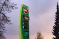 MOL petrol station banner presenting fuel prices in sunset