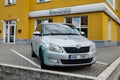 Skoda Fabia car of the Kooperativa Vienna Insurance Group company parked in front of the office