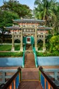 Chinese gateway by the Lake at Haw Par Villa, Singapore. Royalty Free Stock Photo