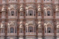 Hawa Mahal, pink palace of winds in old city Jaipur, Rajasthan, India. Background of indian architecture Royalty Free Stock Photo