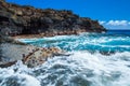 Below Hawaii`s Lava Rock Sea Cliffs and into the Ocean Caves