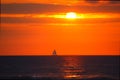 Hawaii sunset with sailboat