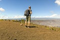 The Hawaii volcano tourist man at Halemaumau crater in Kilauea caldera in Hawaii Volcanoes National Park, big Island Royalty Free Stock Photo