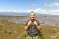 The Hawaii volcano tourist man at Halemaumau crater in Kilauea caldera in Hawaii Volcanoes National Park, big Island Royalty Free Stock Photo