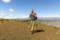 The Hawaii volcano tourist man at Halemaumau crater in Kilauea caldera in Hawaii Volcanoes National Park, big Island Royalty Free Stock Photo