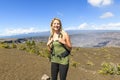 The Hawaii volcano tourist woman at Halemaumau crater in Kilauea caldera in Hawaii Volcanoes National Park Royalty Free Stock Photo