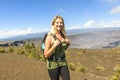 The Hawaii volcano tourist woman at Halemaumau crater in Kilauea caldera in Hawaii Volcanoes National Park Royalty Free Stock Photo