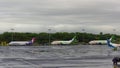 Hawaiian Airlines Boeing 717 and Aloha Air Cargo Boeing 737 freighters parked at the apron of Honolulu Airport