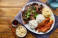 Hawaiian bbq plate with mix of chicken katsu, korean kalbi beef short ribs, rice, and macaroni salad Royalty Free Stock Photo