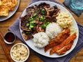 Hawaiian bbq plate with mix of chicken katsu, korean kalbi beef short ribs, rice, and macaroni salad