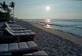 Hawaiian Beach Sunset with Chairs Royalty Free Stock Photo