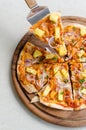 Hawaiian Chicken BBQ Italian Pizza on wood dish Royalty Free Stock Photo