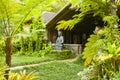 Hawaiian house with statue in the jungle kawaii united states