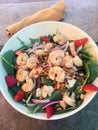 Hawaiian lunch salad with shrimp, greens and strawberries