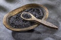 Hawaiian natural black salt in the wooden bowl