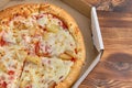 Hawaiian Pizza In A Cardboard Box. Food Delivery Concept