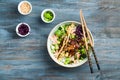 Hawaiian poke bowl flat lay view from above.