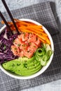 Hawaiian Poke Bowl with Salmon and Vegetables Over Rice