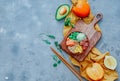 Hawaiian salmon poke bowl with rice, avocado, cucumber, carrot, chukka and sesame seeds Royalty Free Stock Photo