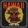 Hawaiian tiki mask and leafs vector colored decorative illustration in vintage style with text and grunge textures on Royalty Free Stock Photo