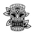 Hawaiian tiki mask and leafs vector illustration in monochrome vintage style isolated on white background