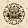 Hawaiian tiki wooden head colored vector round vintage emblem, badge, label, logo or t-shirt print. Illustration on