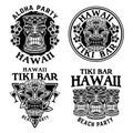 Hawaiian tiki wooden head set of four vector monochrome emblems, badges, labels, stickers or logos in vintage style