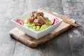 Hawaiian tuna poke bowl with avocado, radishes and sesame seeds