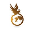 Hawk over the globe. Gold falcon with crone over the planet earth. Logo Royalty Free Stock Photo