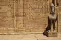 Hawk statue and hieroglyphics in the Edfu temple