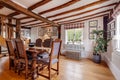 Traditional timber beam furnished dining room
