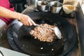 Hawker frying cooking fried carrot cake or kueh kak