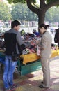 Hawker selling headwear