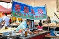 Hawkers and peddlers selling food and grocery in walking street