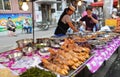 Hawkers and peddlers selling food and grocery in walking street